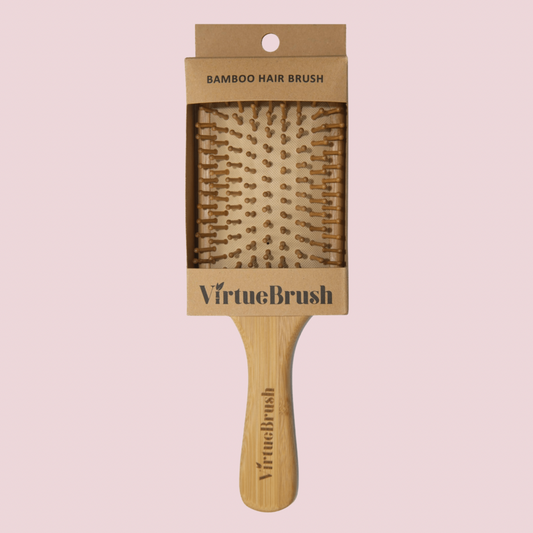 Bamboo Paddle Brush - Eco-friendly hairbrush with gentle detangling and massaging capabilities.